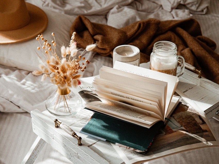 book, bouquet, cup, table, bed, comfort