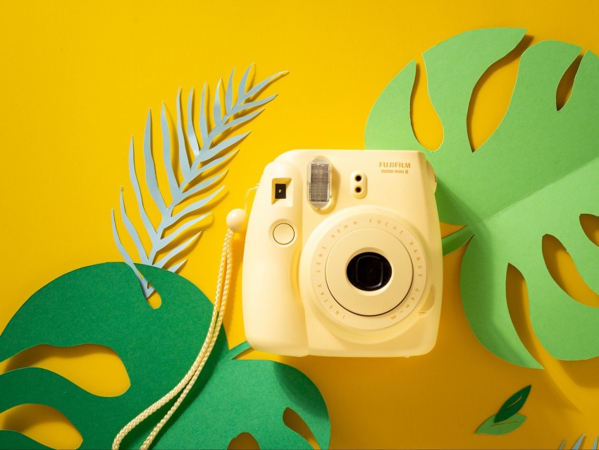 Yellow Polaroid Camera - This helps capture the perfect photo every