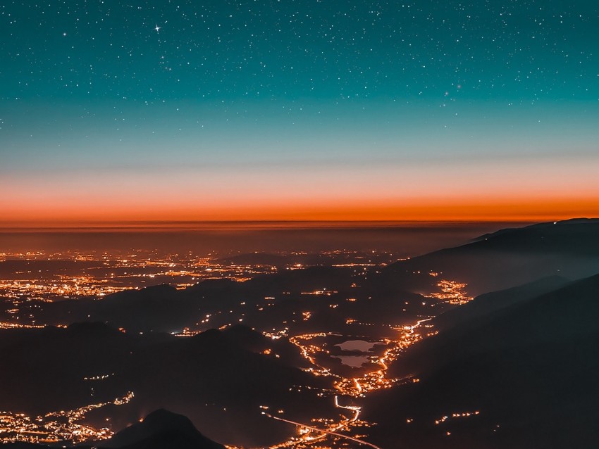 night city, aerial view, mountains, lights, starry sky