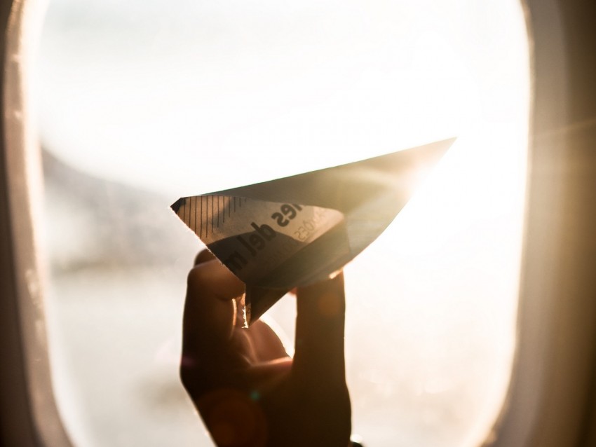 porthole, paper airplane, window, sunlight